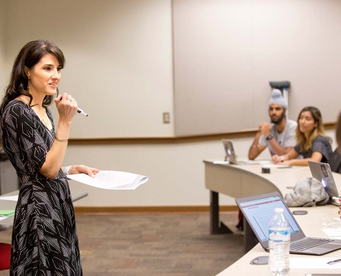 Public Administration and Policy Professor Amanda Abraham teaches a class.