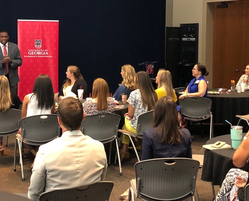 Johnelle Simpson, former UGA SGA president, speaks to a corporate alumni group from Chick-Fil-A