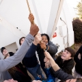 Prospective students ring the Chapel Bell while touring campus