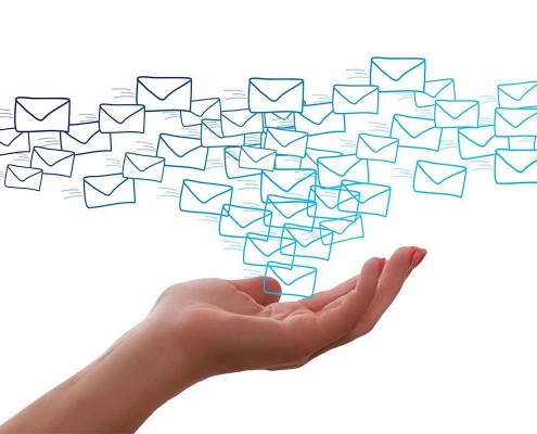 Hand cradling representations of emails