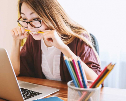 Photo of woman at laptop computer