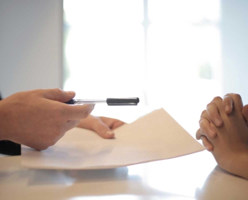 close up of hands during business discussion